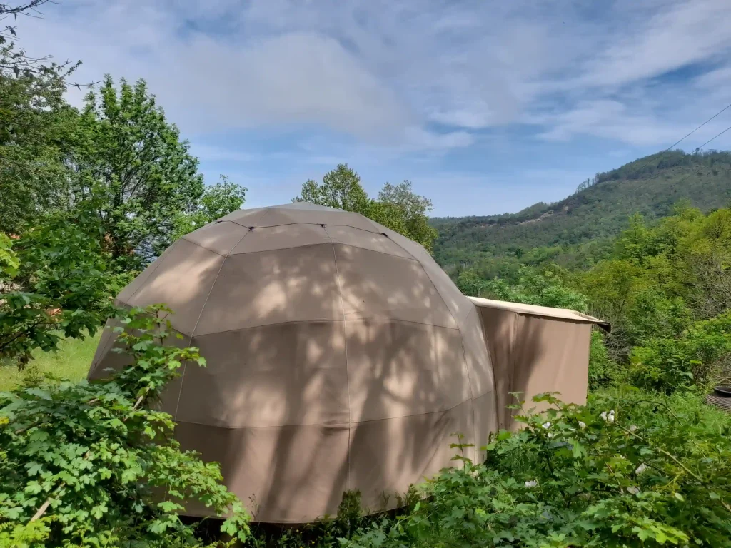 Dome surrounded by nature and its entrance airlock