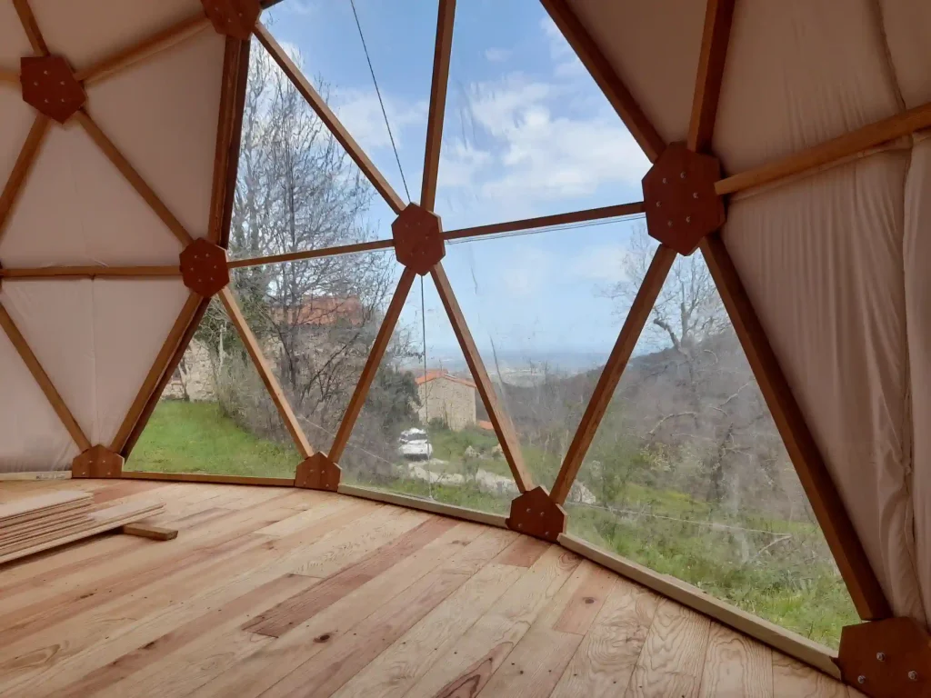 A beautiful floor, a panoramic view for this beautiful wooden geodesic dome made by Domeciel